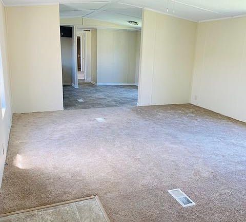 $34,500.00 for home then $305 per month - Livingroom from front door