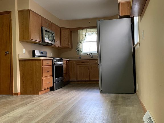 The kitchen is large enough to combine the dining area, or add a buffet table or kitchen island