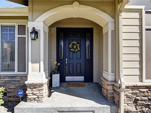 Beautiful & welcoming front porch.