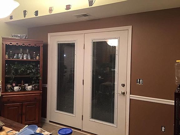 French doors with blinds
