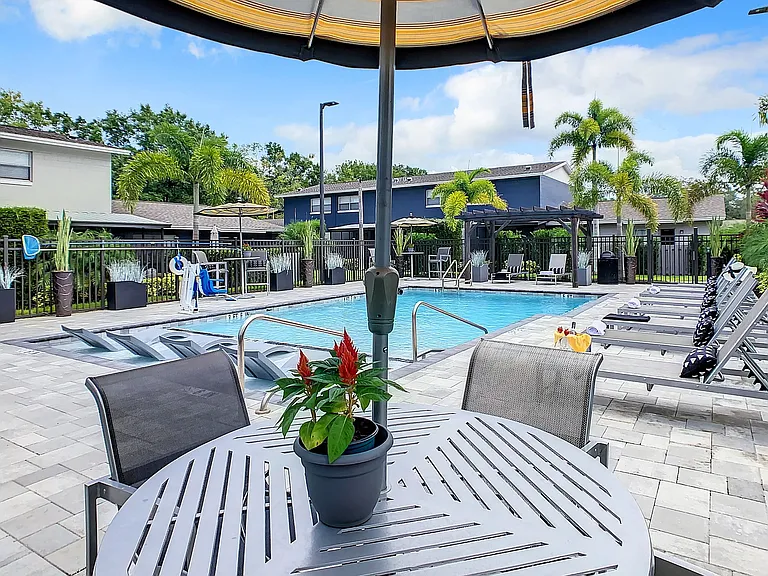 Our expansive sundeck features poolside seating all around for an enjoyable setting.