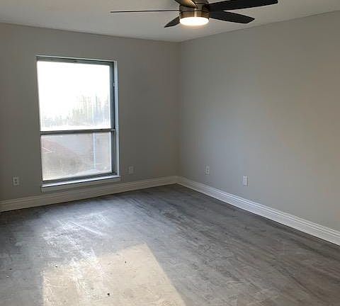 Bedroom overlooking the pool. New fan with remote and LED lighting. All the construction dust will be thoroughly cleaned up next week.