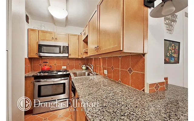 Sold by Douglas Elliman | media 13