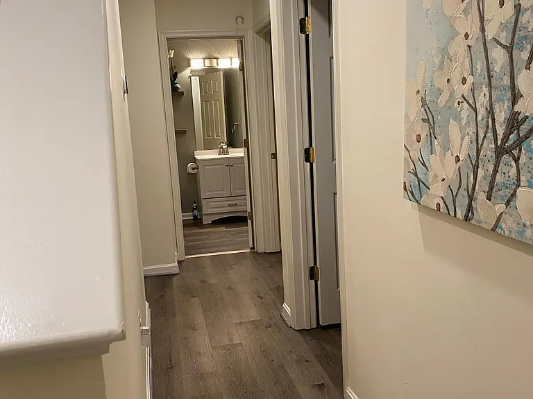 2nd Floor Hallway - leading to the Full bathroom, and to the right is the 2nd & 3rd bedroom