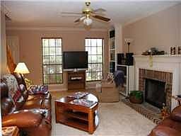 Family Room w/custom shelving and mantle