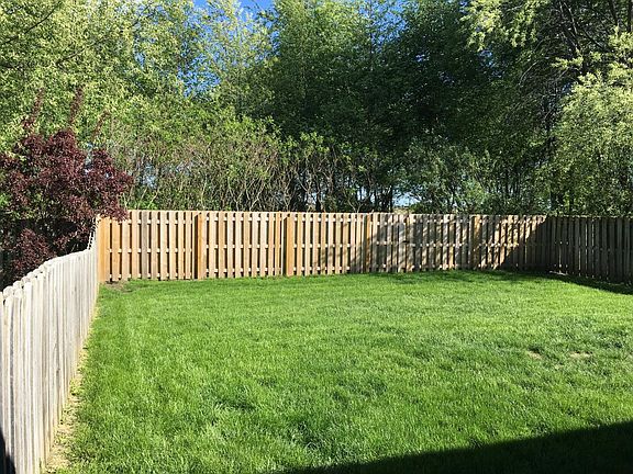 Fenced back yard for pets!