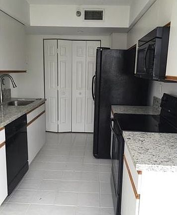 5th image of 3500 Mystic Pointe Dr APT 505