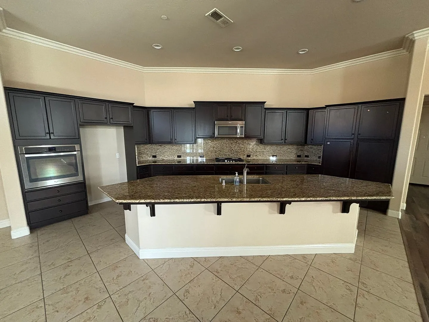 4-Bedroom Home with 3-Car Garage, Office, Gated Community Pool & HOA Included — Photo 2