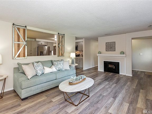 Gorgeous plank flooring with woodstove for those cool fall evenings!