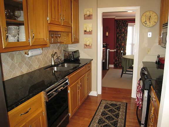 Cook's Kitchen with new stainless steel appliances and granite countertops