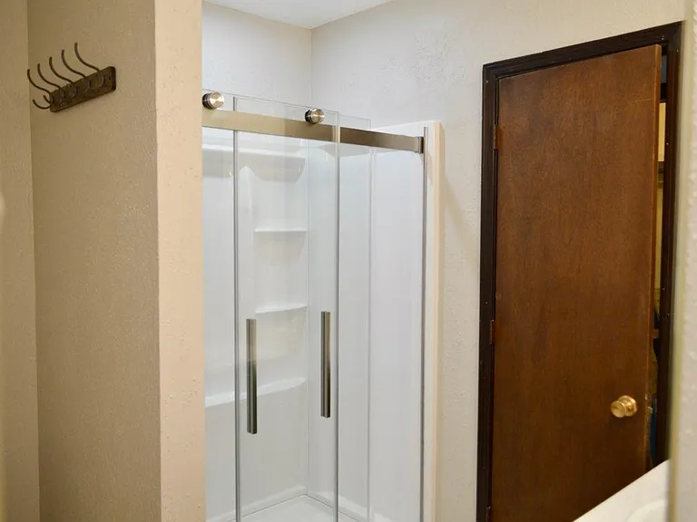 Master Bath-Brand new shower, floors, lighting and counter with double sinks.