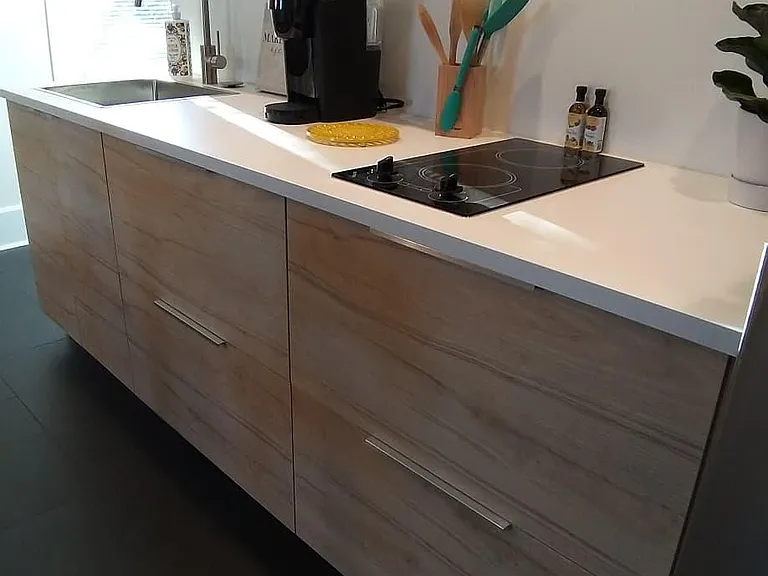 Brand new kitchen, stainless steel refrigerator and energy efficient electric cooktop.