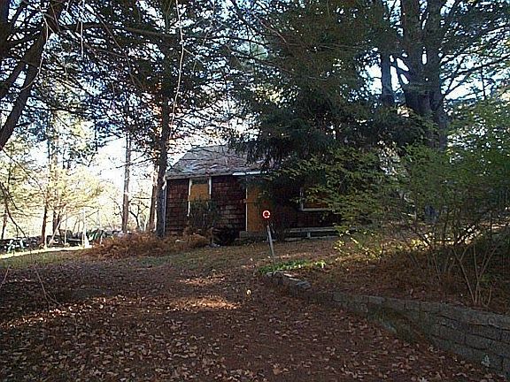 No bathroom, running water. Just a cool out building which can be renovated.
