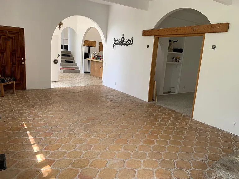 View from entertaining room into dinning area and living room
