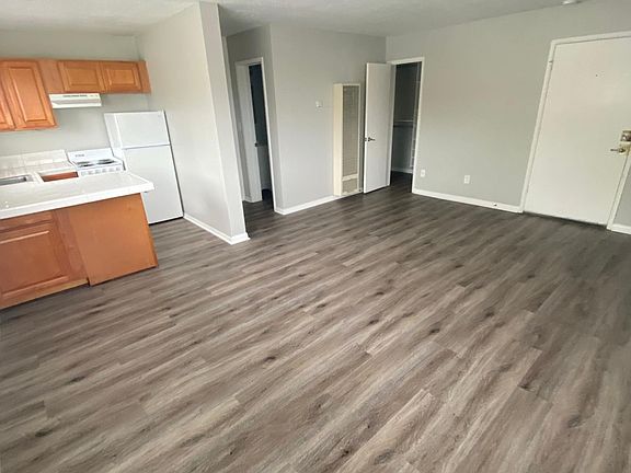 Kitchen, Hall to Bath, Open Door is Walk In Closet, Entry Door On Right.