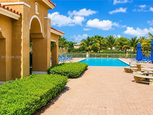 The Courts At Doral Isles — Photo 1
