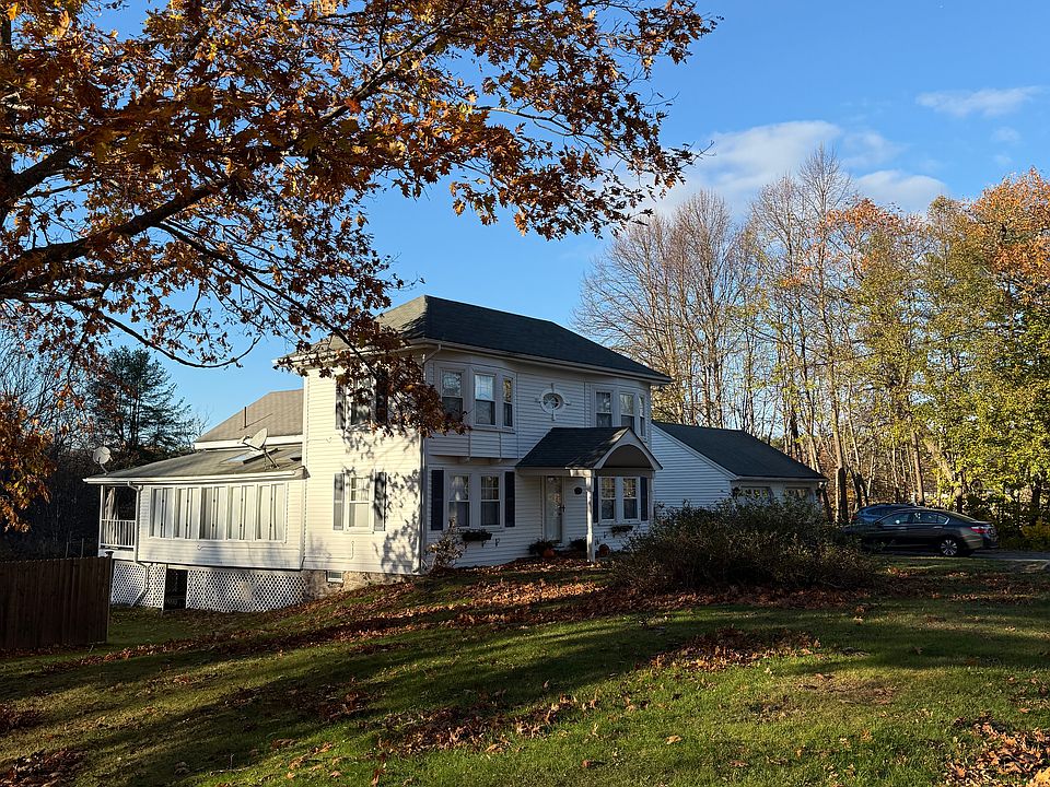 Side view of the house showing one of the two sun rooms.
