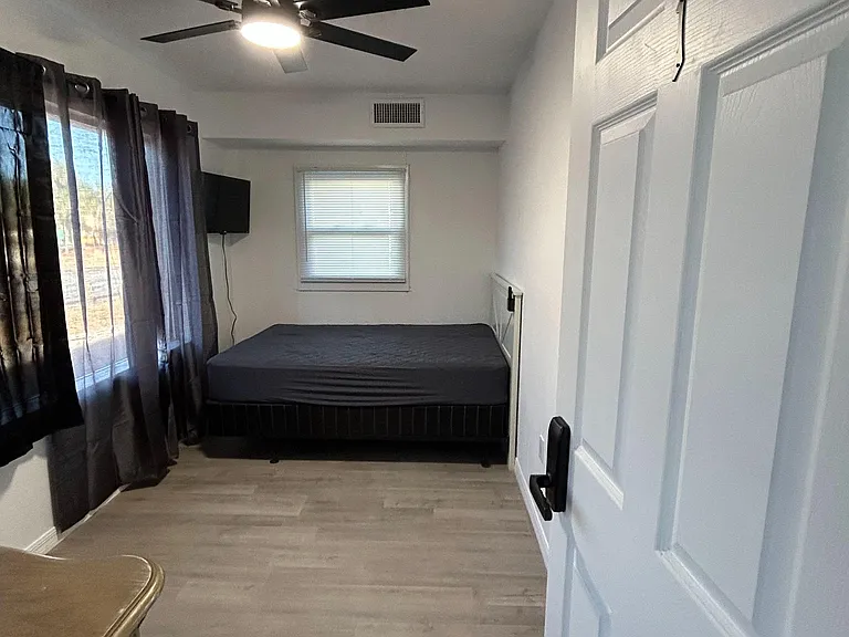 Tv, full size bed, fan.
