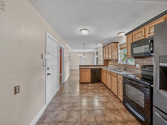 5th image of 6014 Carmel Dr NW