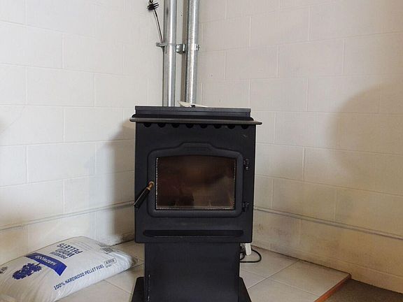 Pellet stove in basement