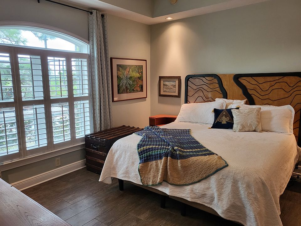 Master Bedroom With Shutters