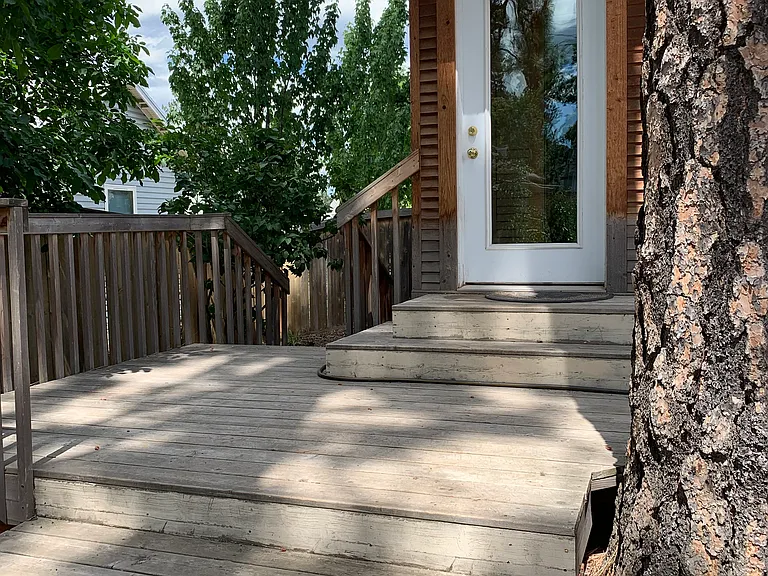 Back deck in private back yard.