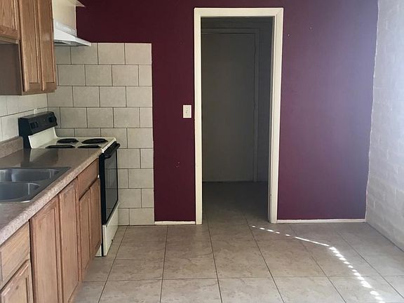 Kitchen to laundry and yard