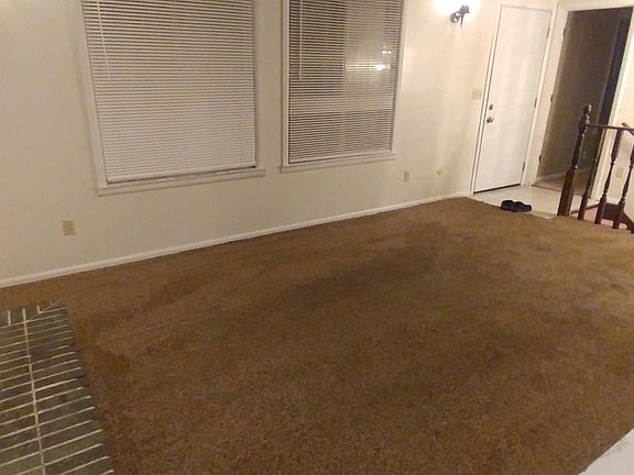 Front room & entry door.