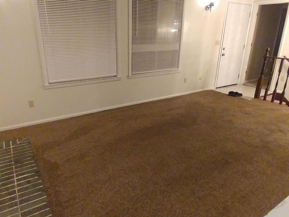 Front room & entry door.