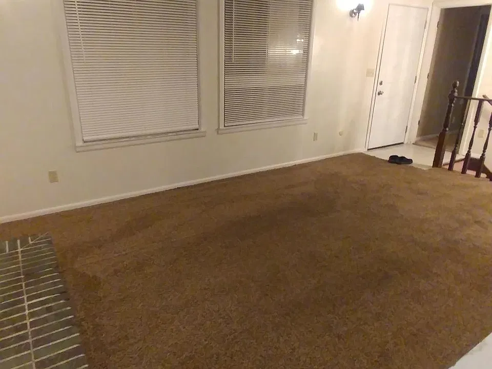 Front room & entry door.
