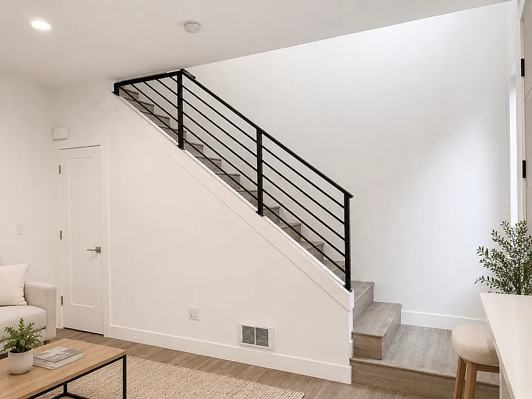 Living room. Stairs to the 2nd floor. 
2nd floor has the bedrooms and the deck