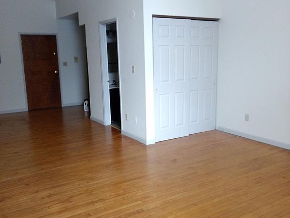 Full size closet. Hanging space, shelves & show rack.