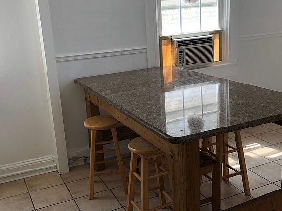 Kitchen with granite table and stools