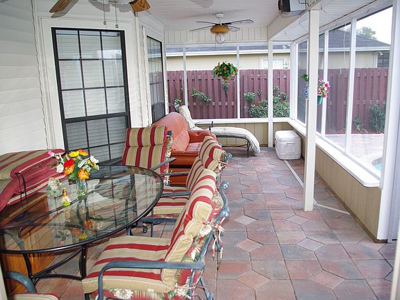 Nice outdoor tile and ceiling fans.