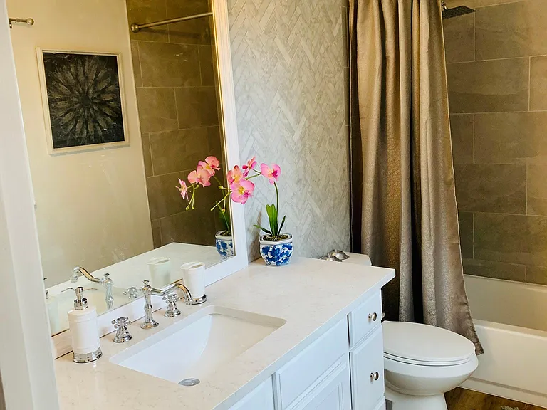 new master bathroom with herringbone backspalsh