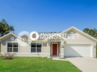 909 Anthony St E, Lehigh Acres, FL 33974