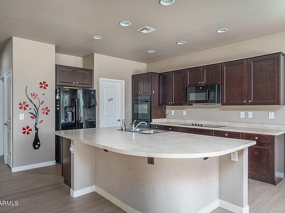 5th image of 10217 W MARGUERITE Avenue