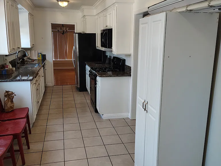 4734 Allott Ave — Photo 10