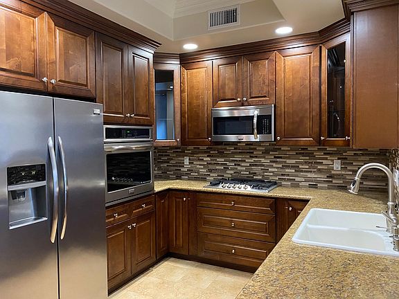 2nd image of 10950 Bloomfield St Unit 104