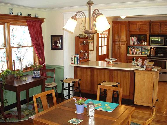 Kitchen overlooks dining room