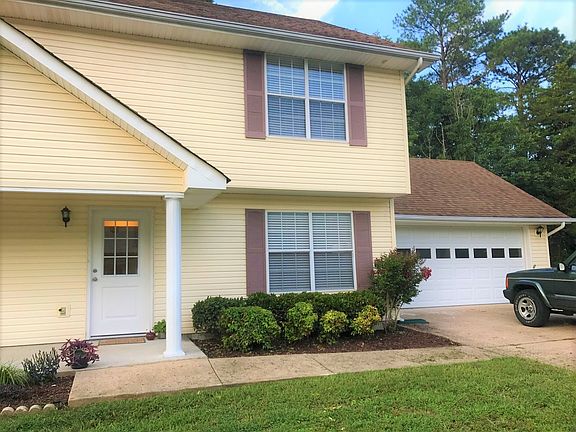 Spacious 2 car garage with additional pull down attic storag