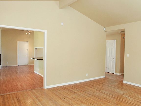 Living room opens to kitchen & dining/family room