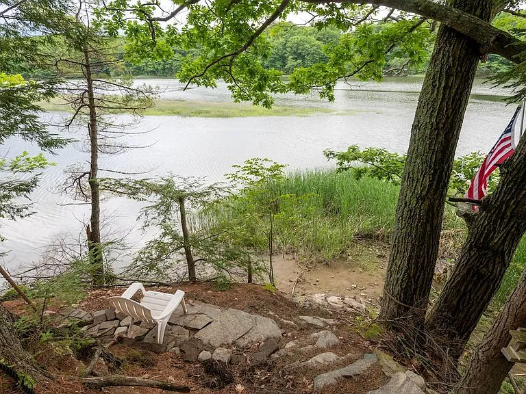 Steps and chair down to the river