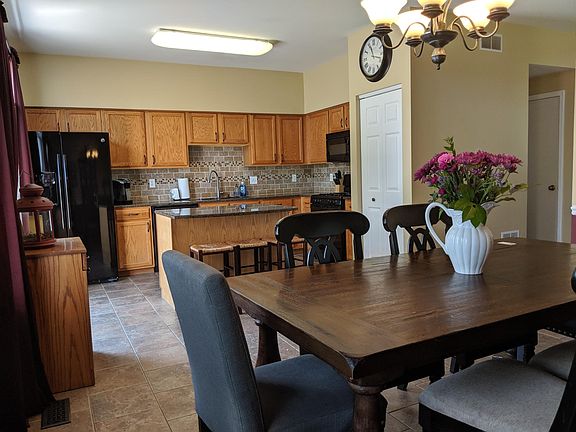 Kitchen with island and granite counters