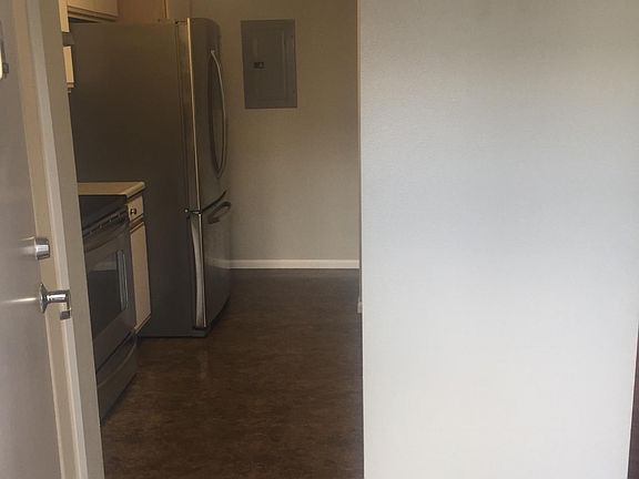 Front entry showing kitchen