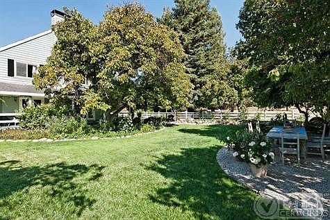 Colorful flower gardens and the canopy of cool green trees make the outdoors the perfect stage for entertaining!