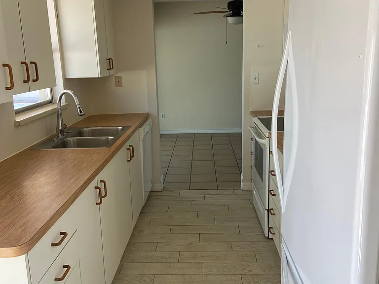 Kitchen view from entering through garage.