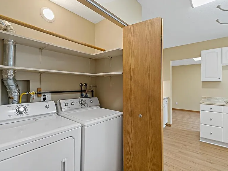 In-unit laundry and storage conveniently located on main level just off kitchen
