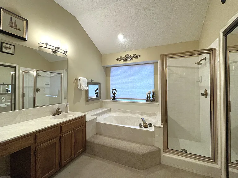 Master bathroom features double sinks, walk-in shower, garden tub, potty room
