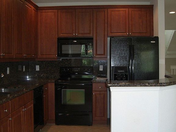 Contempory kitchen with granite counters.